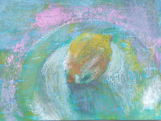 Original art mixed media lemon drawing in oil pastels by Julia Laing on a white table with a cactus plant.
