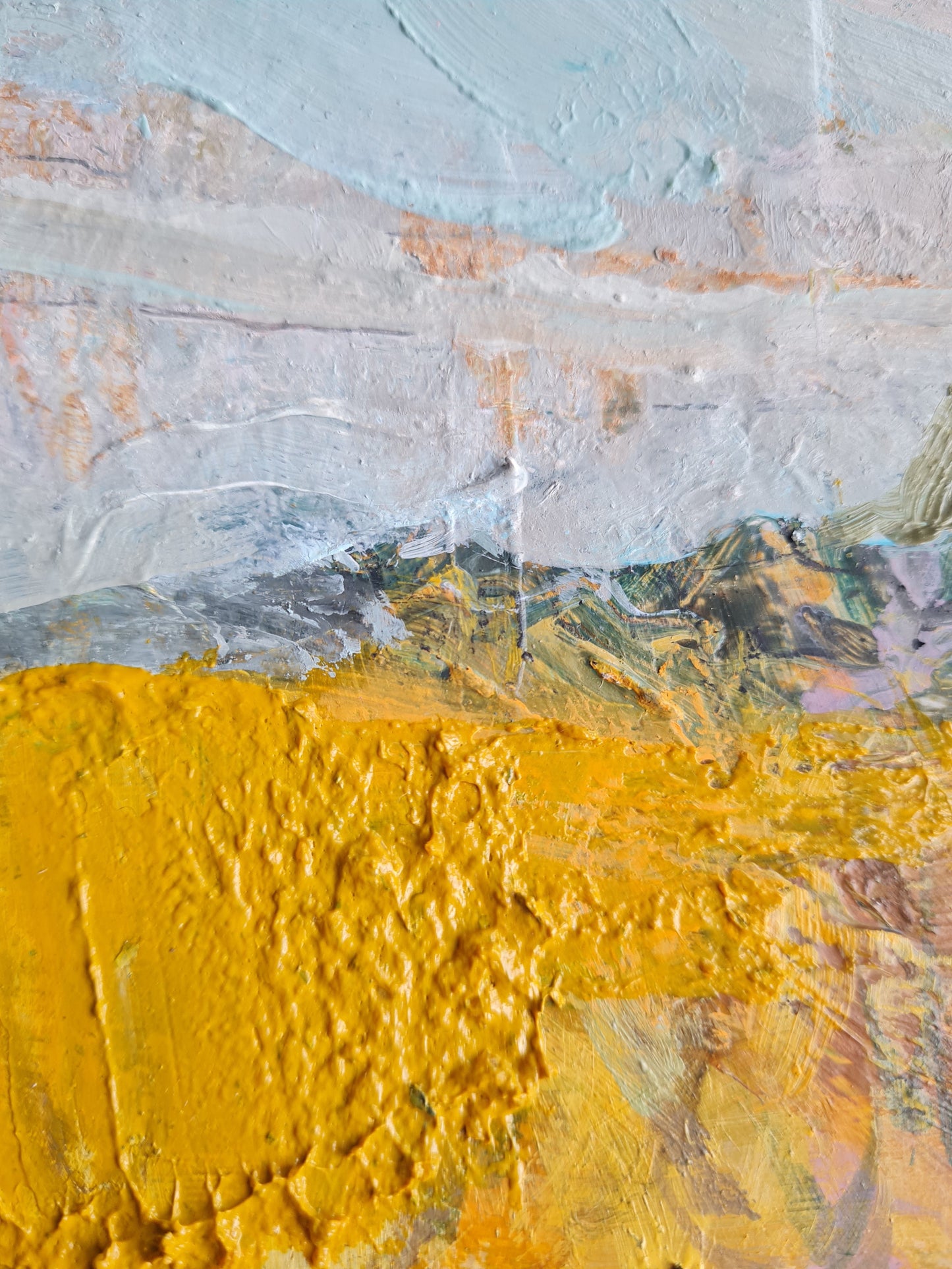 Abstract art paint detail with textured yellow and grey colours