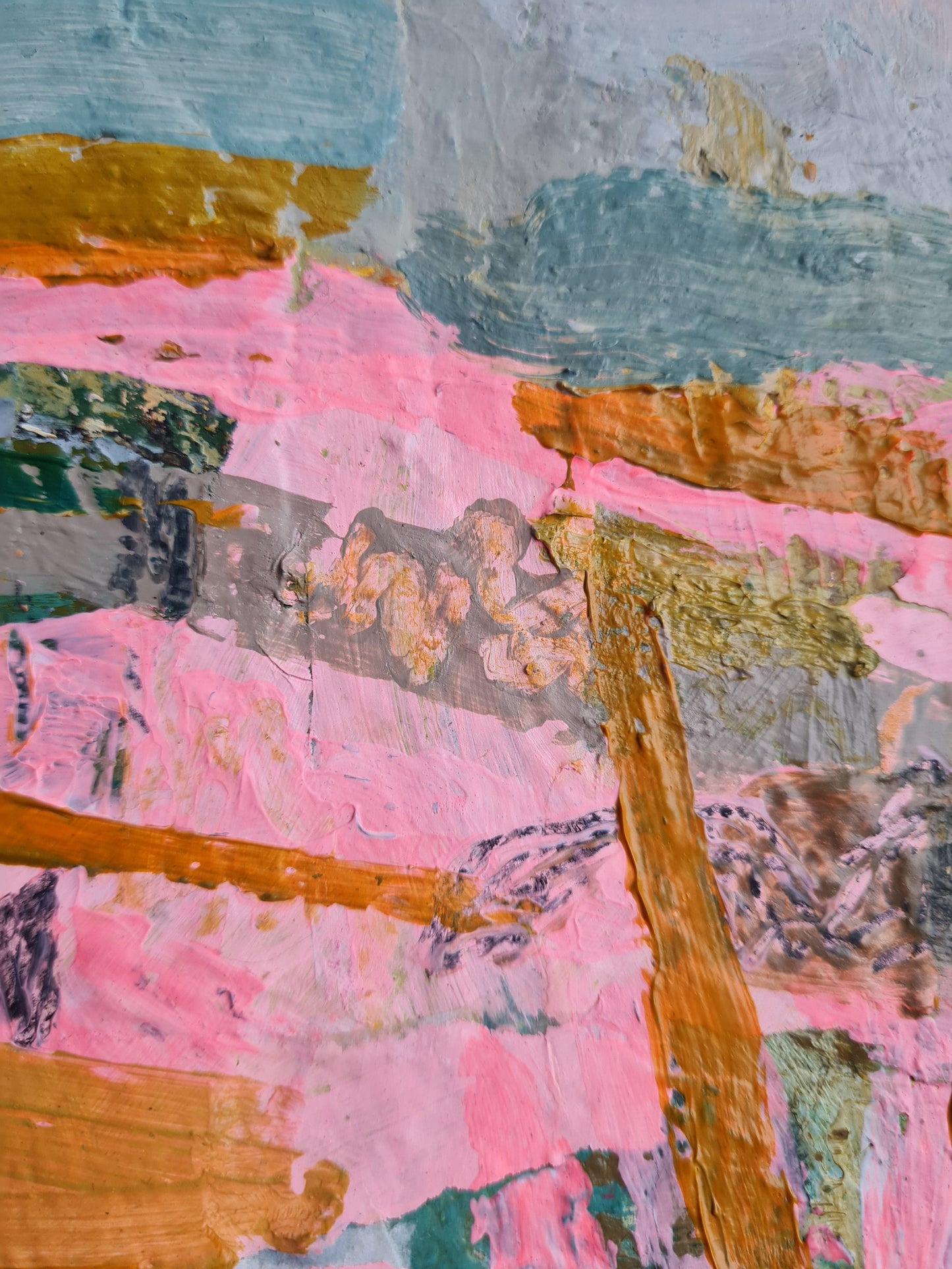 Close up of abstract landscape painting with pink and yellow brushstrokes