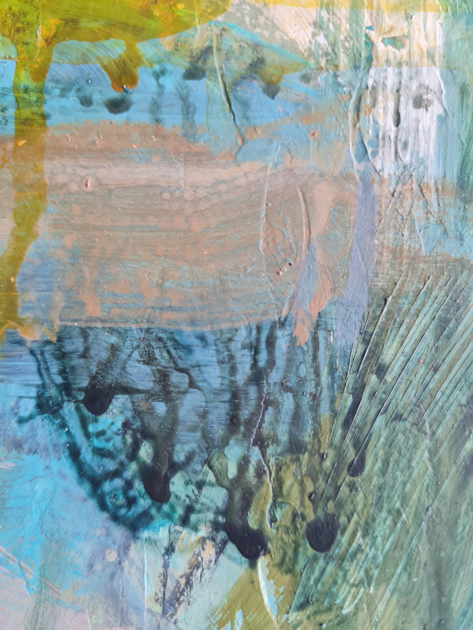 Abstract art detail with textured brush strokes in green, blue, and brown