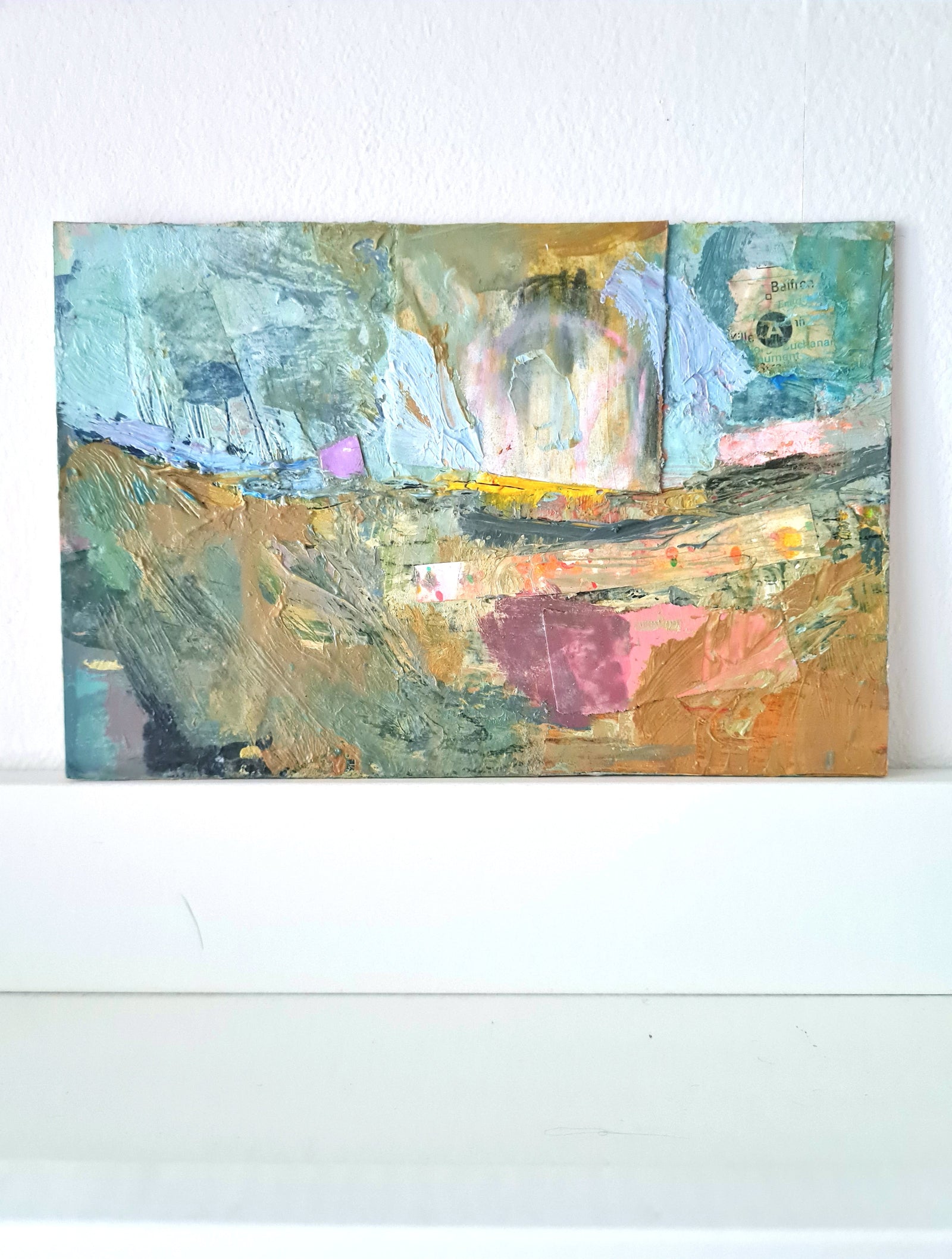 Abstract painting with colorful brush strokes on a white wall