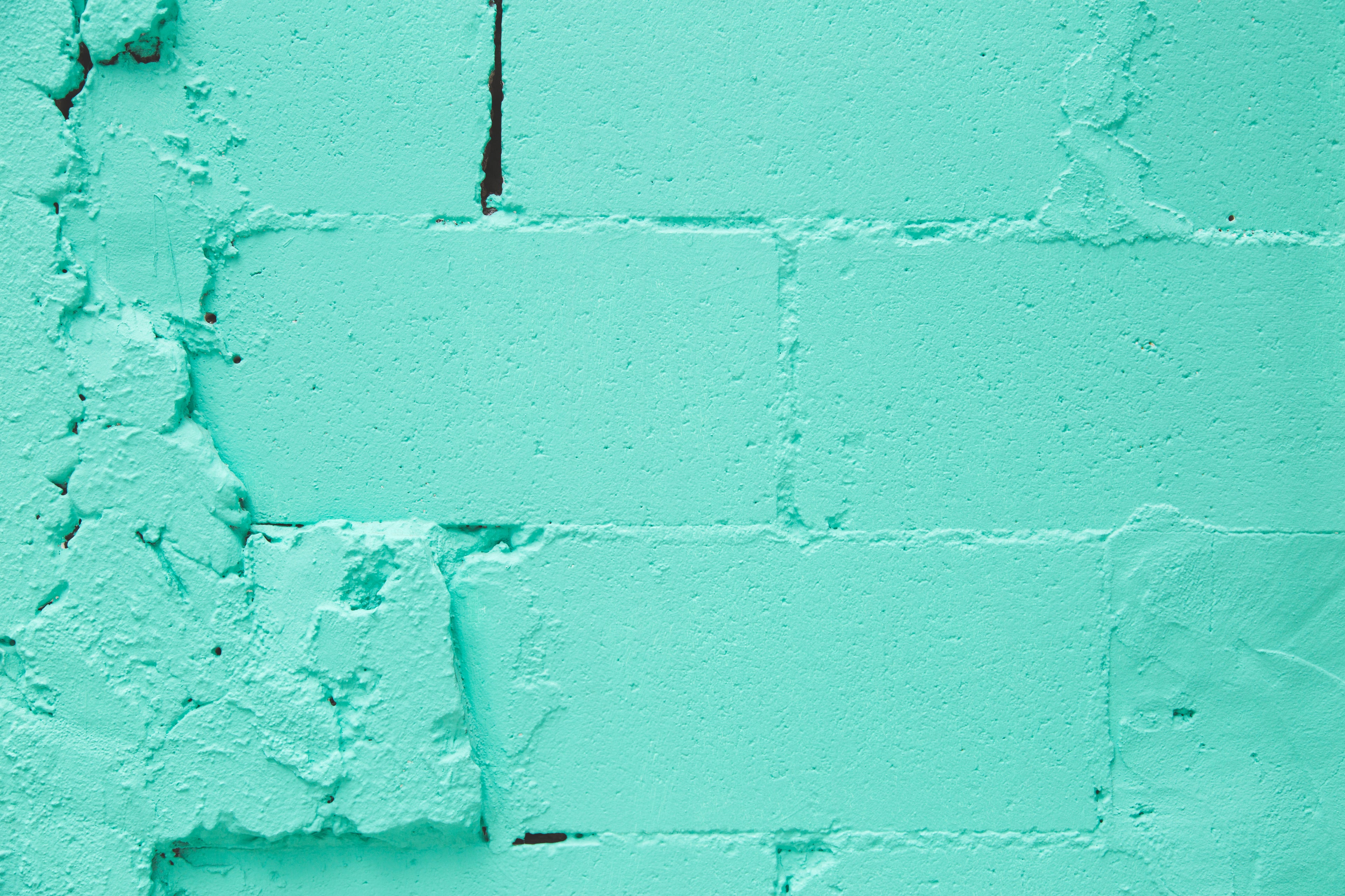 Turquoise brick wall image for shop news banner