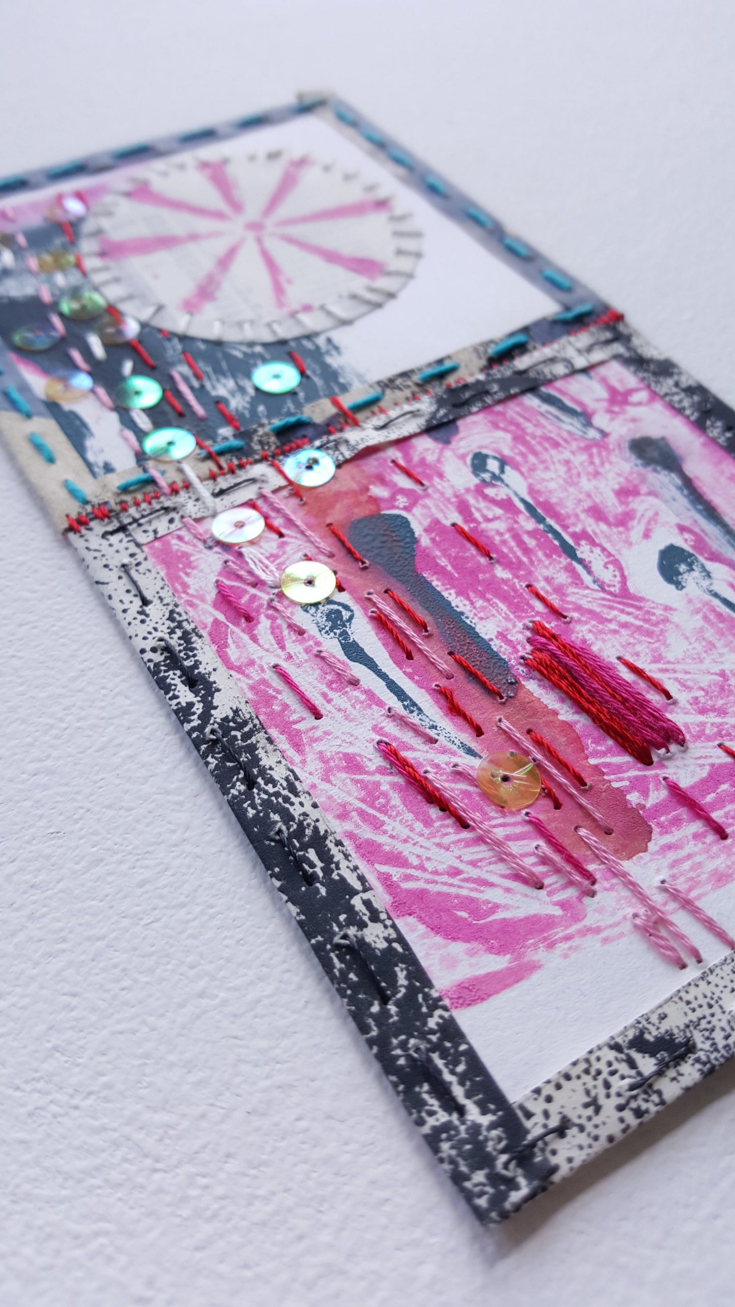 detail of embroidered paper by Julia Laing