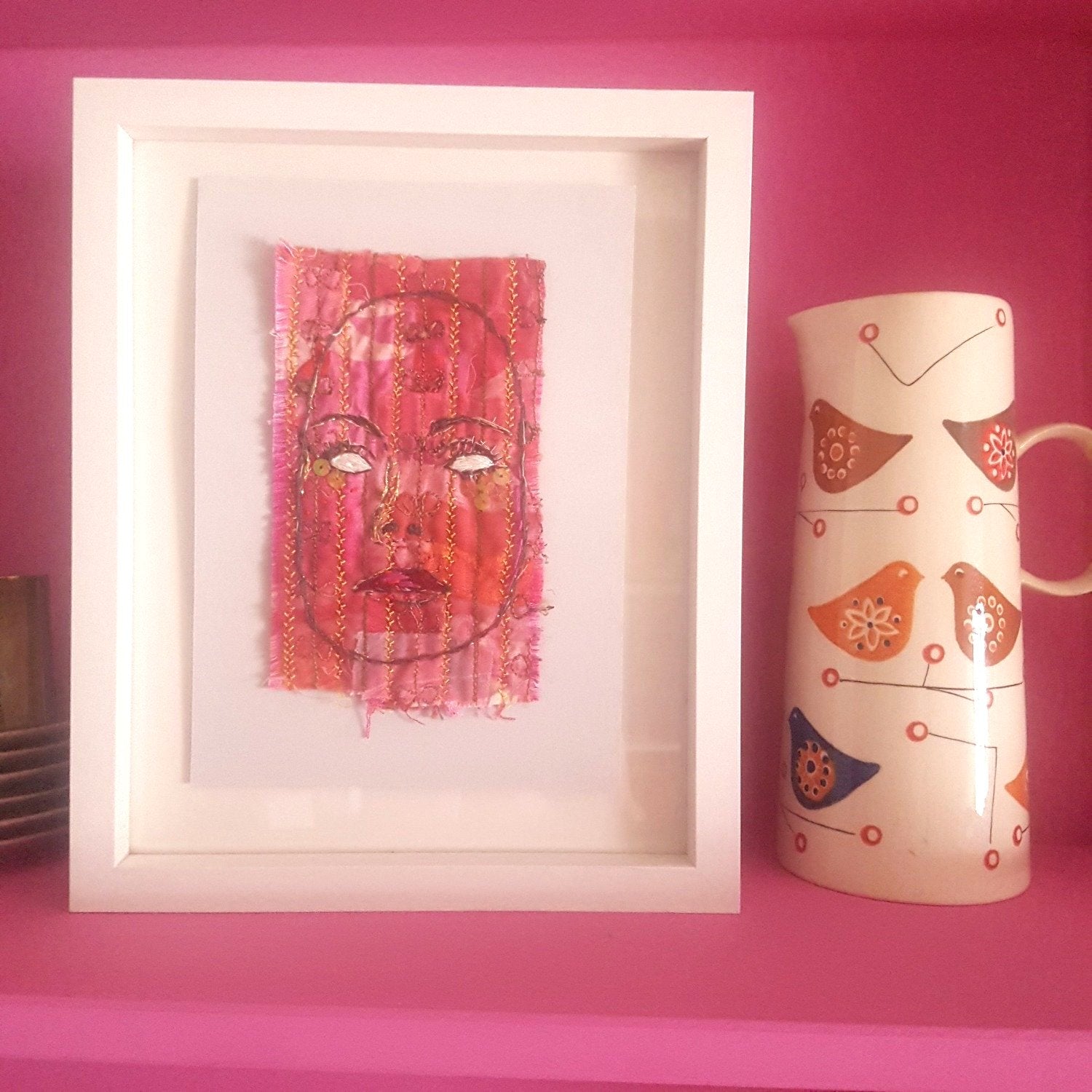 An example of how the embroidery might looked when framed.