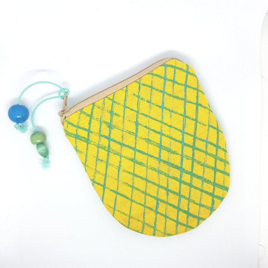 Yellow hand-printed linen coin purse made in Scotland by Julia Laing on a white background