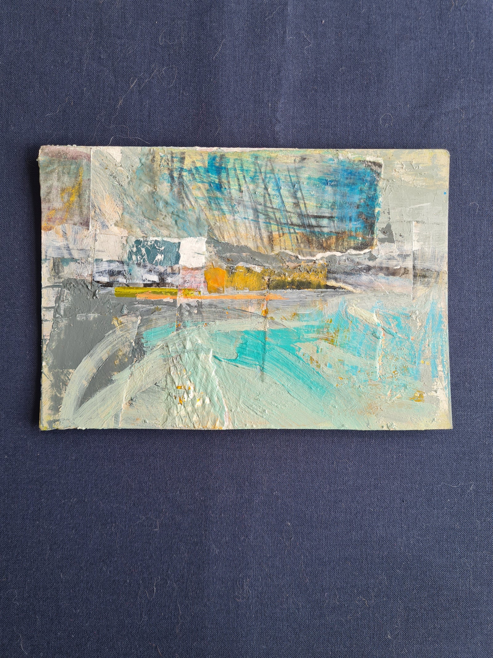 Abstract art piece on a dark blue background