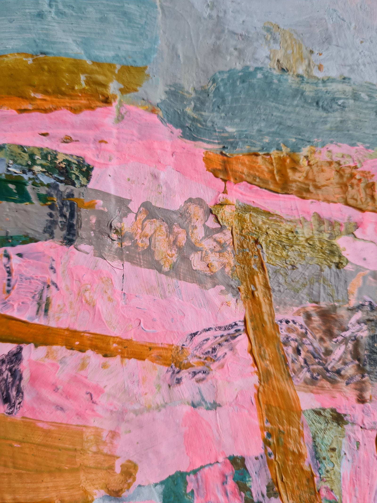 Close up of abstract landscape painting with pink and yellow brushstrokes