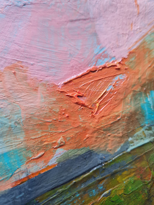 Close-up of a textured surface with colorful brush strokes