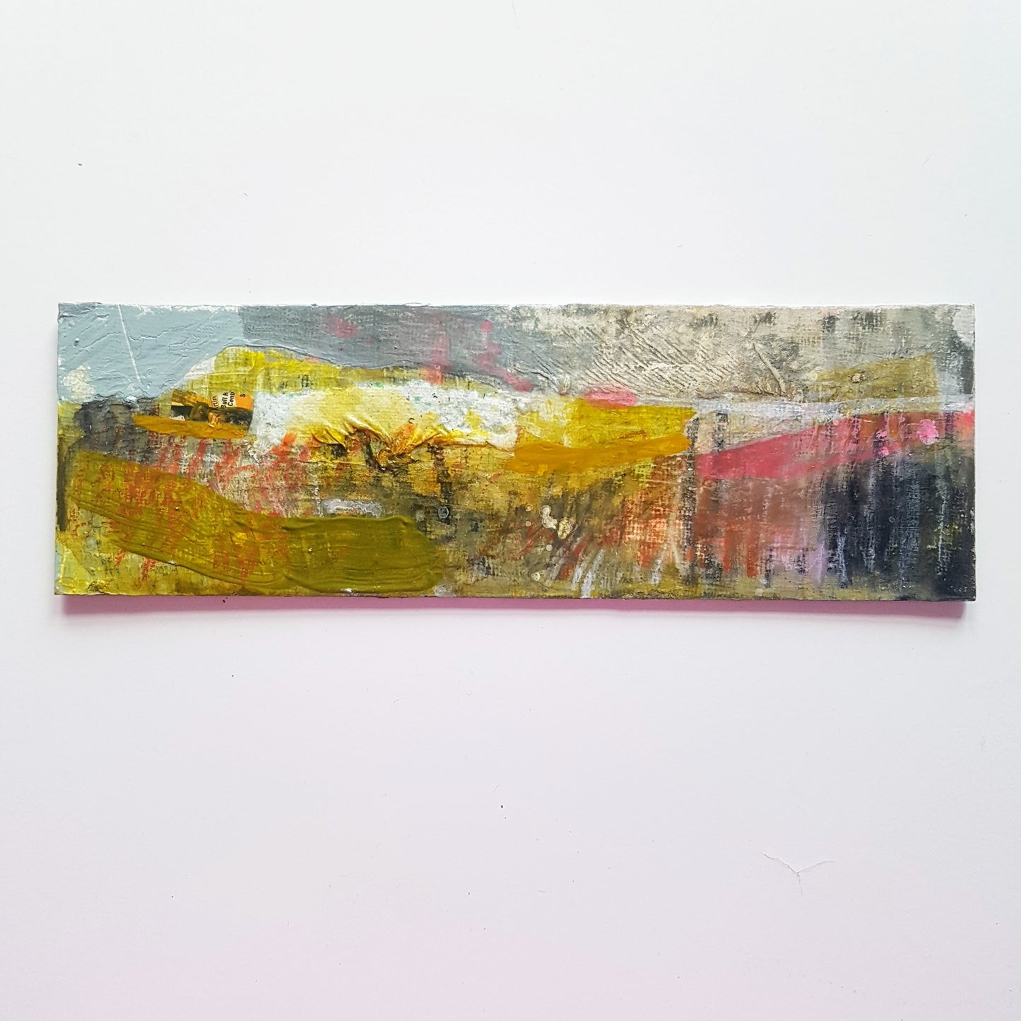 Small horizontal mixed-media landscape painting by Julia Laing on a white background