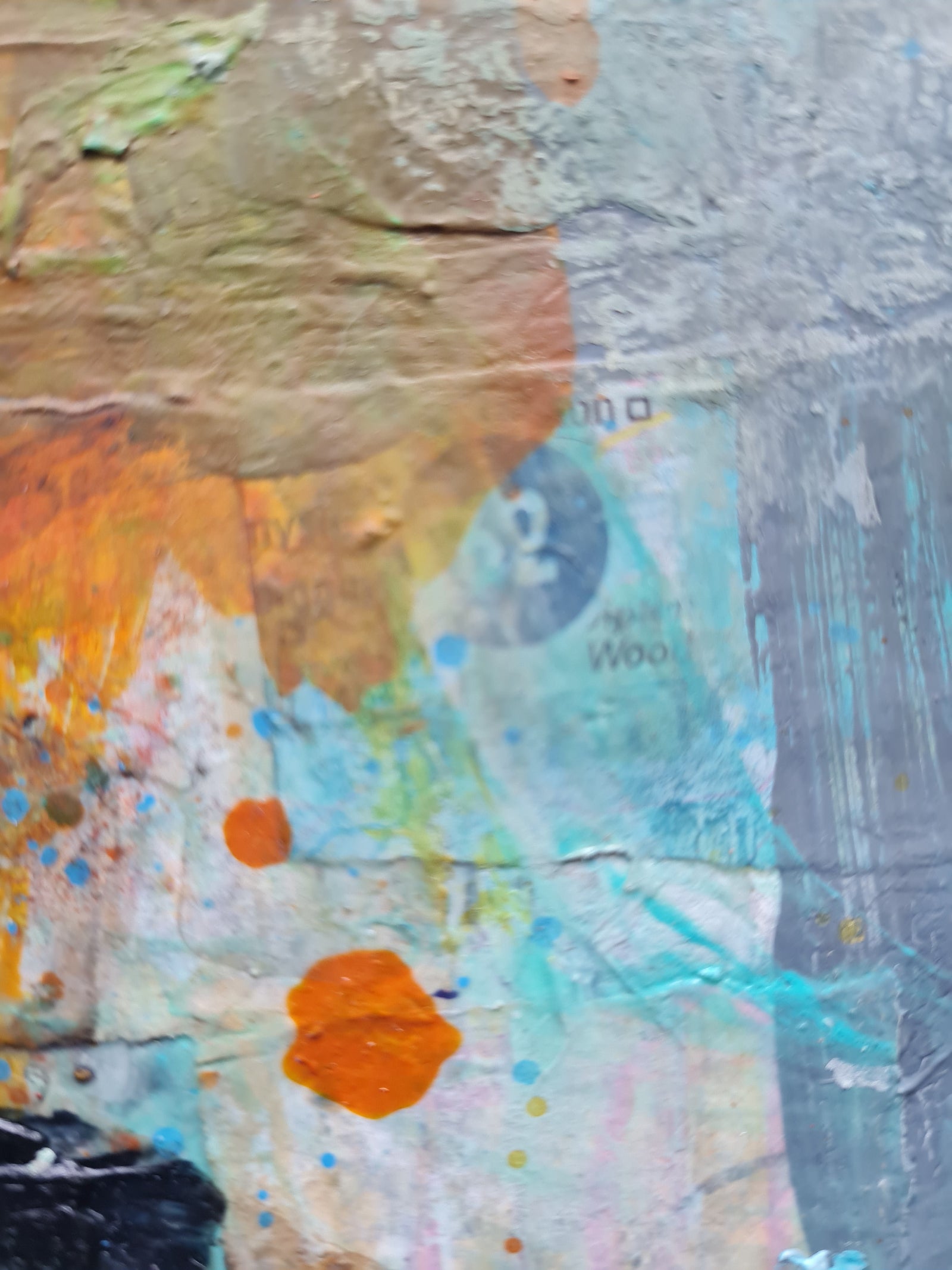Abstract art piece with a mix of colours and textures
