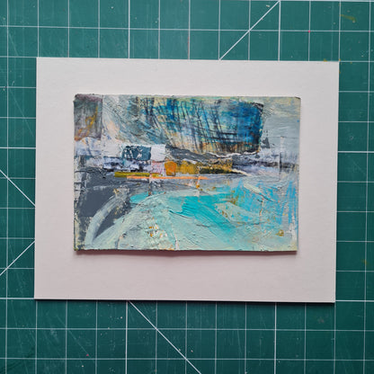 Abstract painting on a white card with a grid background