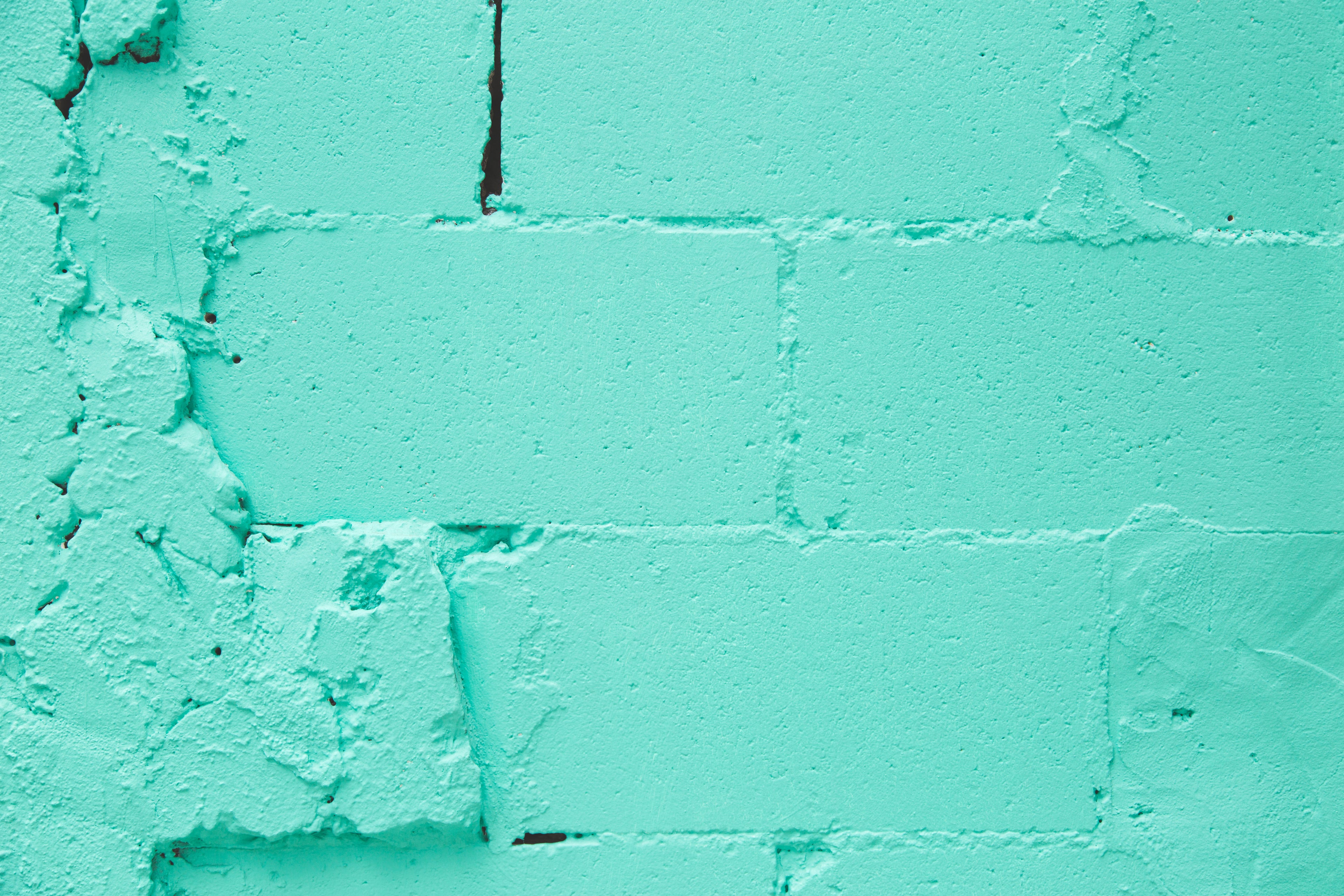 Turquoise brick wall image for shop news banner